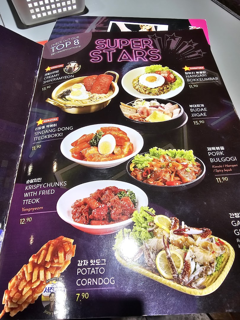 A vibrant menu page showcasing 'Super Stars' Korean street food recommendations with images and prices.