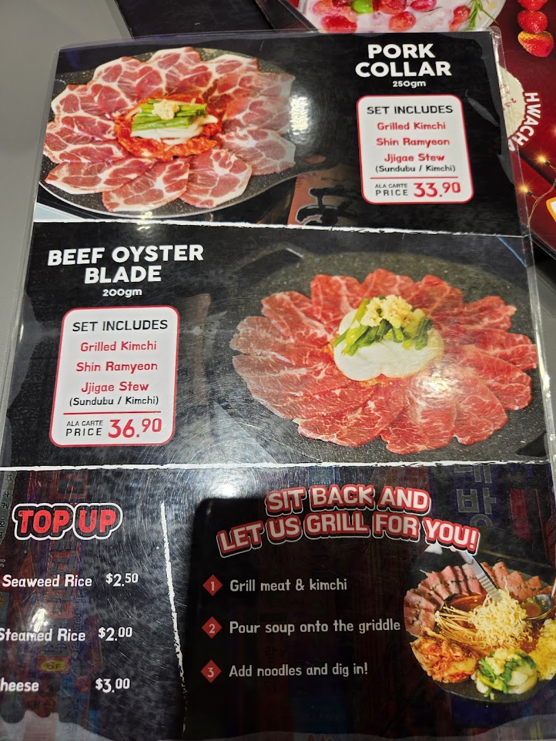 A menu displaying Korean BBQ sets with pork collar and beef oyster blade, along with add-ons.