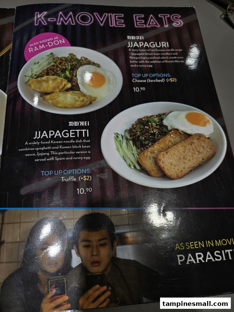 A menu page featuring 'K-MOVIE EATS' with Jjapaguri and Jjapagetti dishes, inspired by Korean cinema.