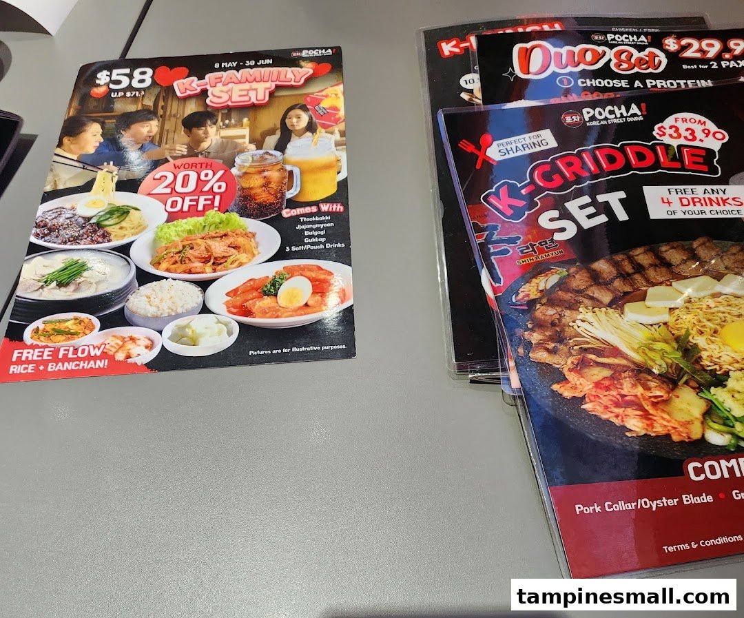 Image displays various promotional menus for POCHA! Korean Street Dining, featuring family sets, duo sets, and griddle sets.