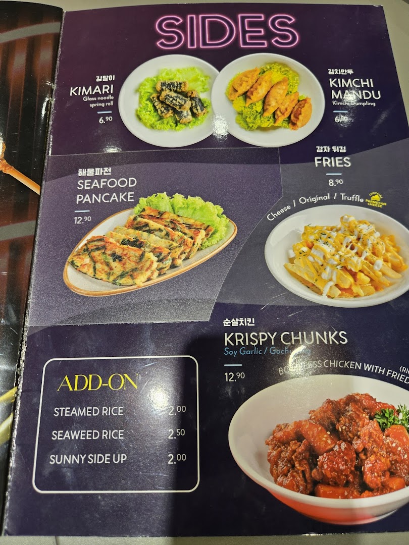 A vibrant menu page showcasing Korean street food sides and add-ons with images and prices.