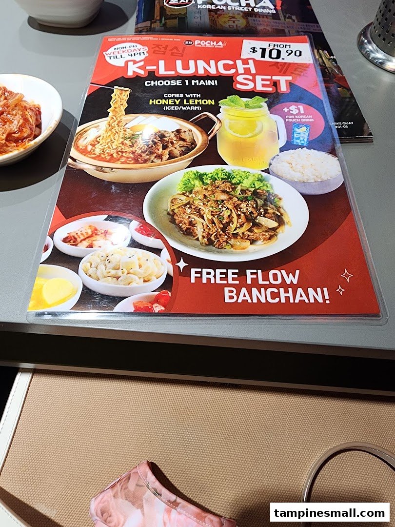 A vibrant menu showcasing POCHA!'s K-Lunch Set with main dishes, drinks, and free-flow banchan.