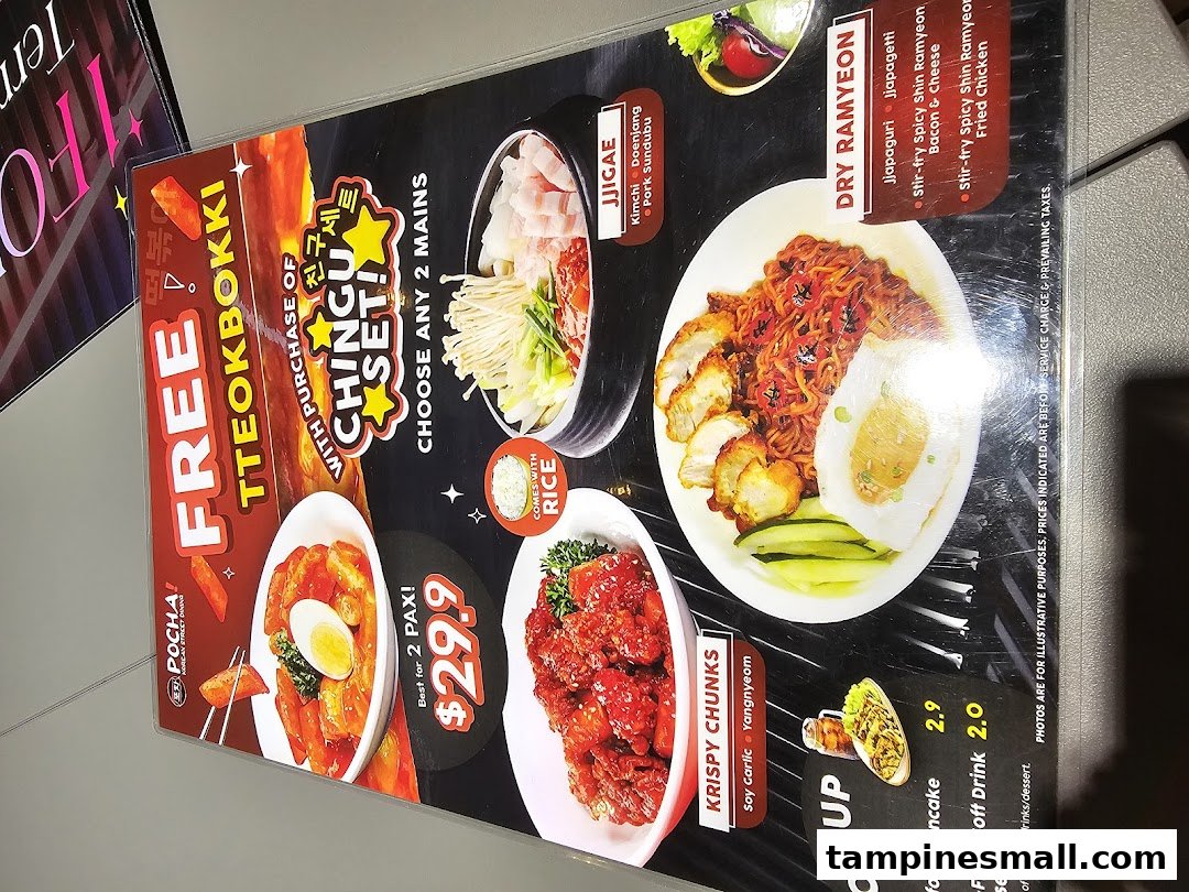 A vibrant menu displaying various Korean dishes, including Tteokbokki, Ramyeon, and fried chicken, with prices and a special offer.