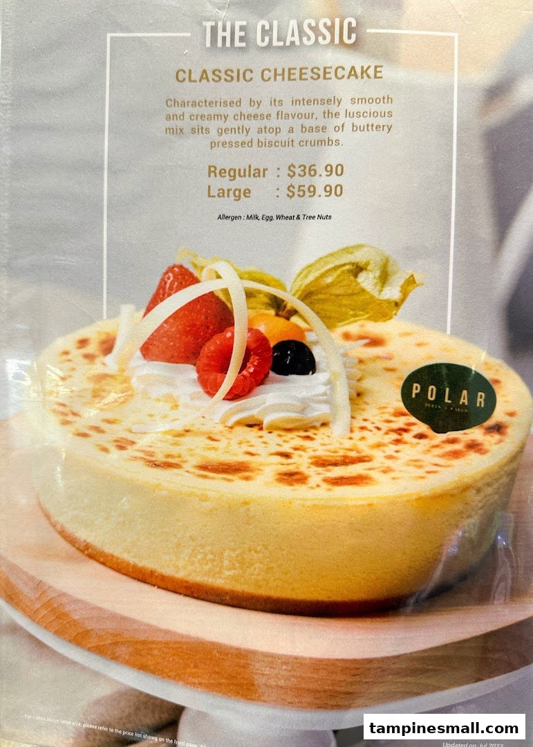 A menu board showcasing Polar Puffs & Cakes' Classic Cheesecake with its description and pricing.