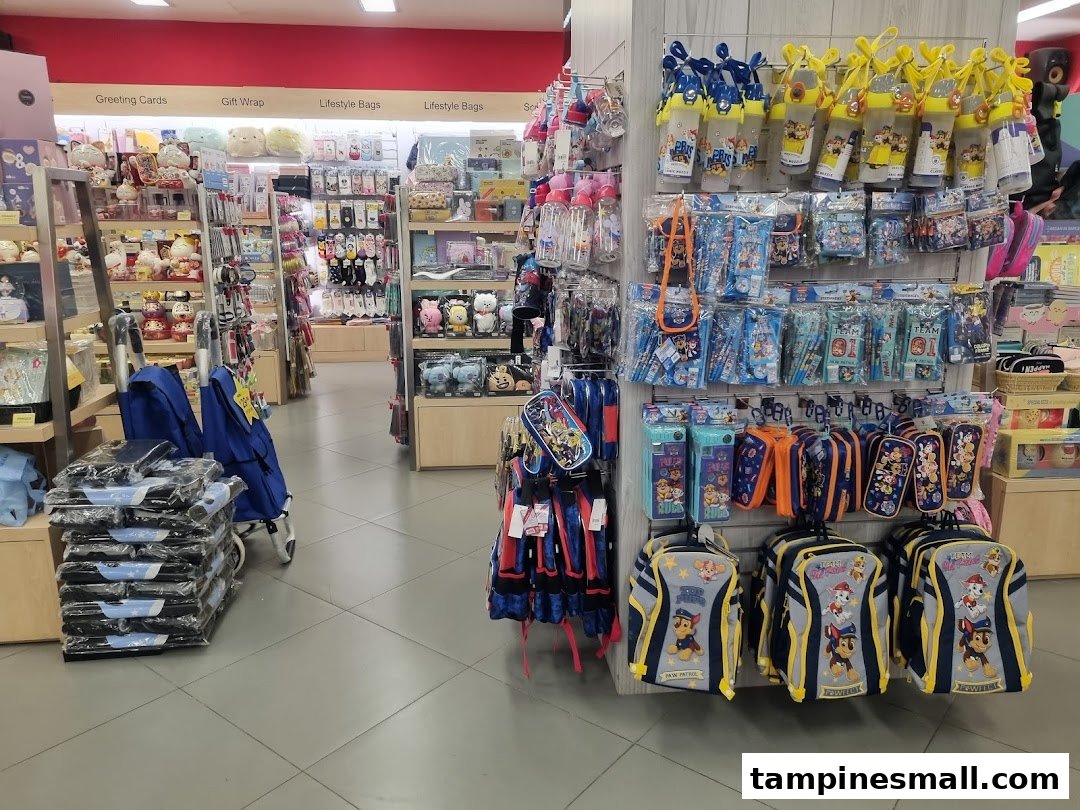 An aisle inside POPULAR Bookstore featuring school supplies, stationery, gifts, and lifestyle items.