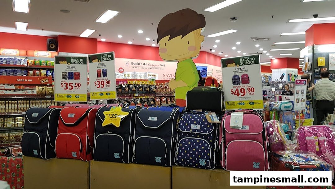 An interior shot of POPULAR Bookstore featuring a 'Back to School' display of children's backpacks.
