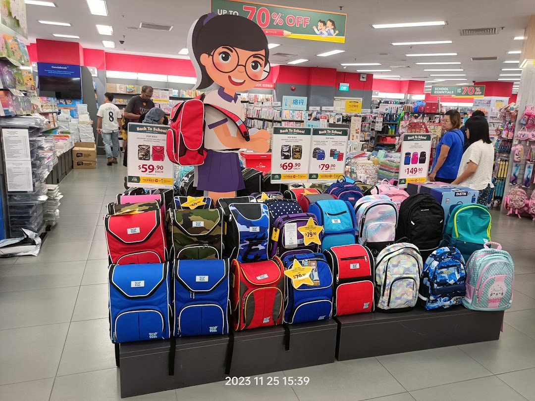 An interior shot of POPULAR Bookstore featuring a large display of school bags and backpacks.