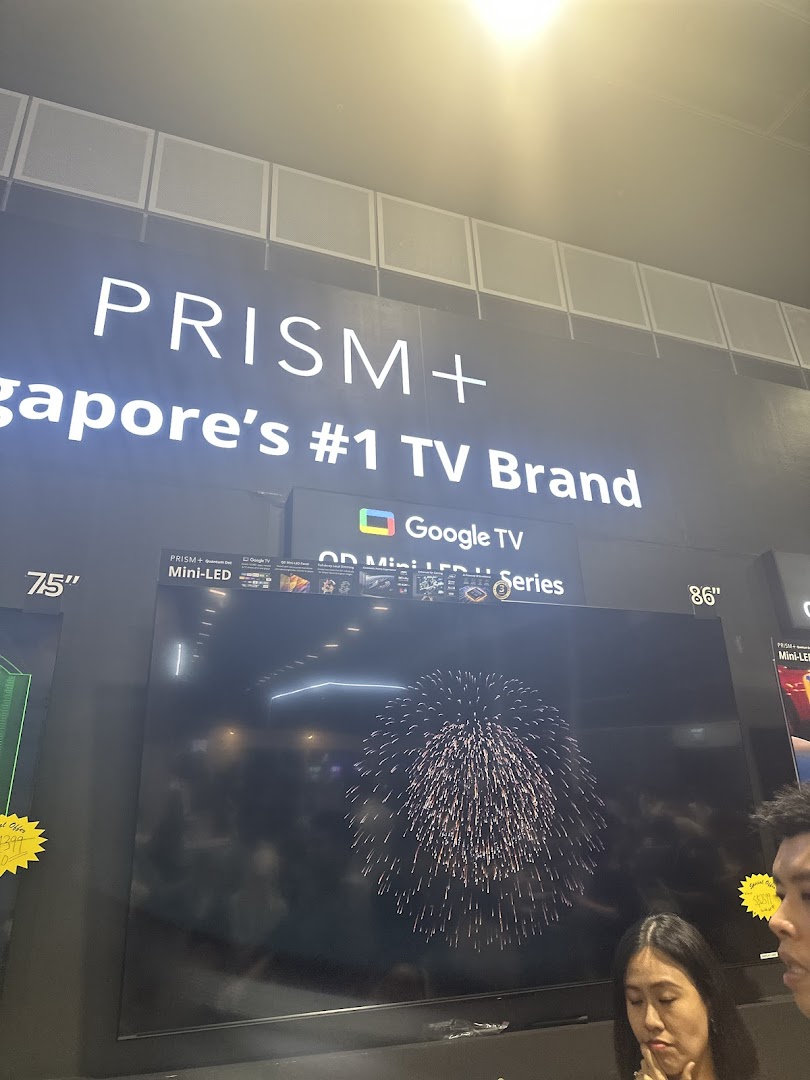 An interior shot of PRISM+ showcasing large screen televisions, including Mini-LED models.