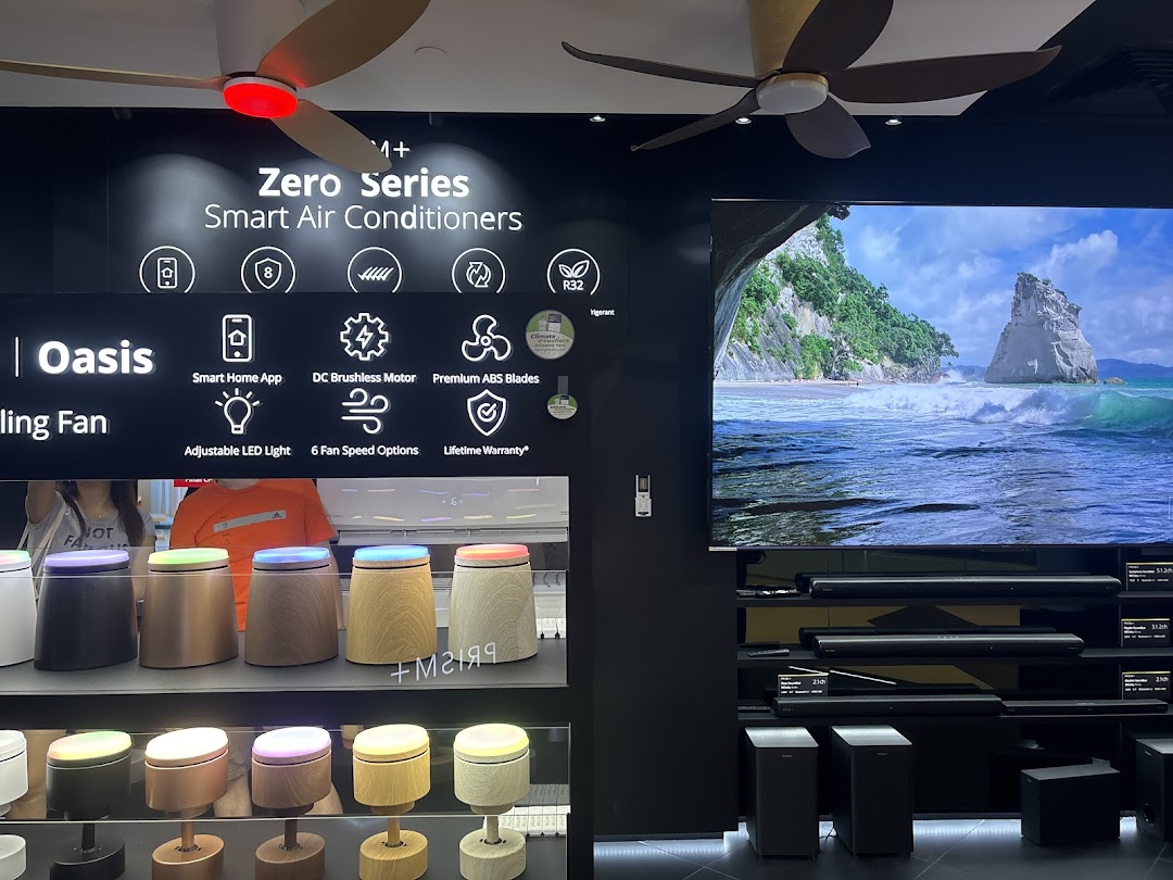 Showcasing smart air conditioners, ceiling fans, and home entertainment systems in a modern retail display.