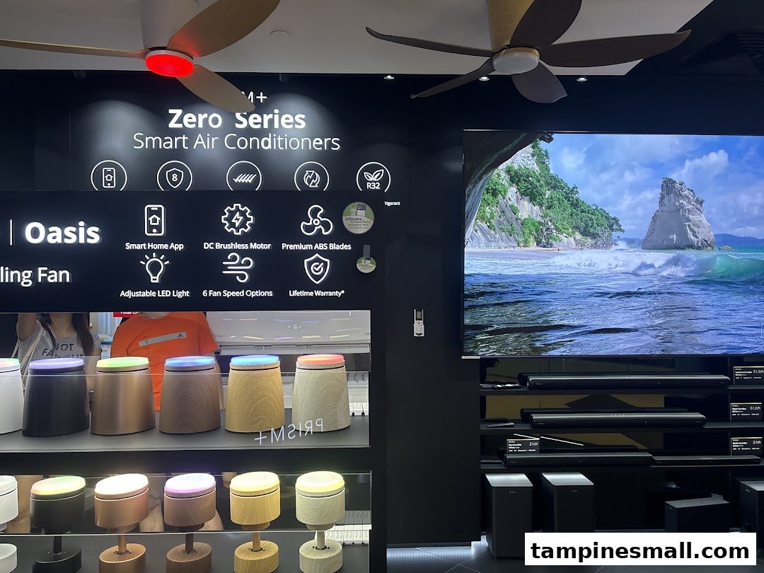 Showcasing smart air conditioners, ceiling fans, and home entertainment systems in a modern retail display.
