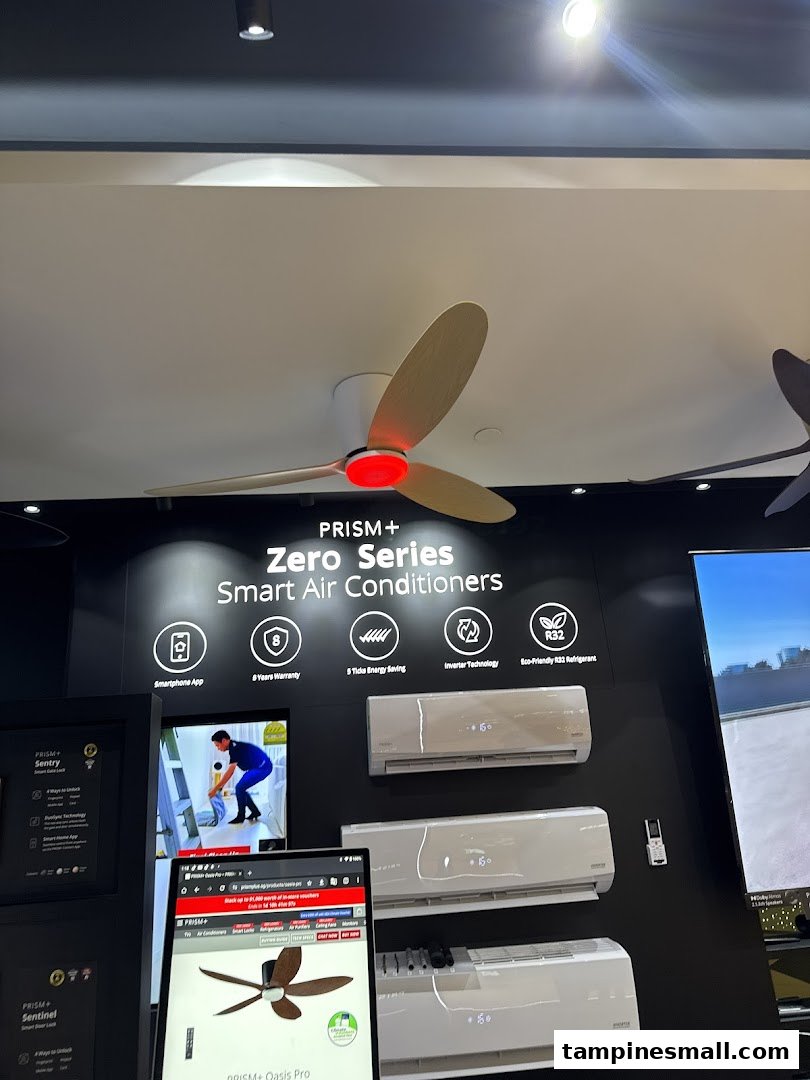 A retail display showcasing PRISM+ Zero Series smart air conditioners and a ceiling fan, with product information.