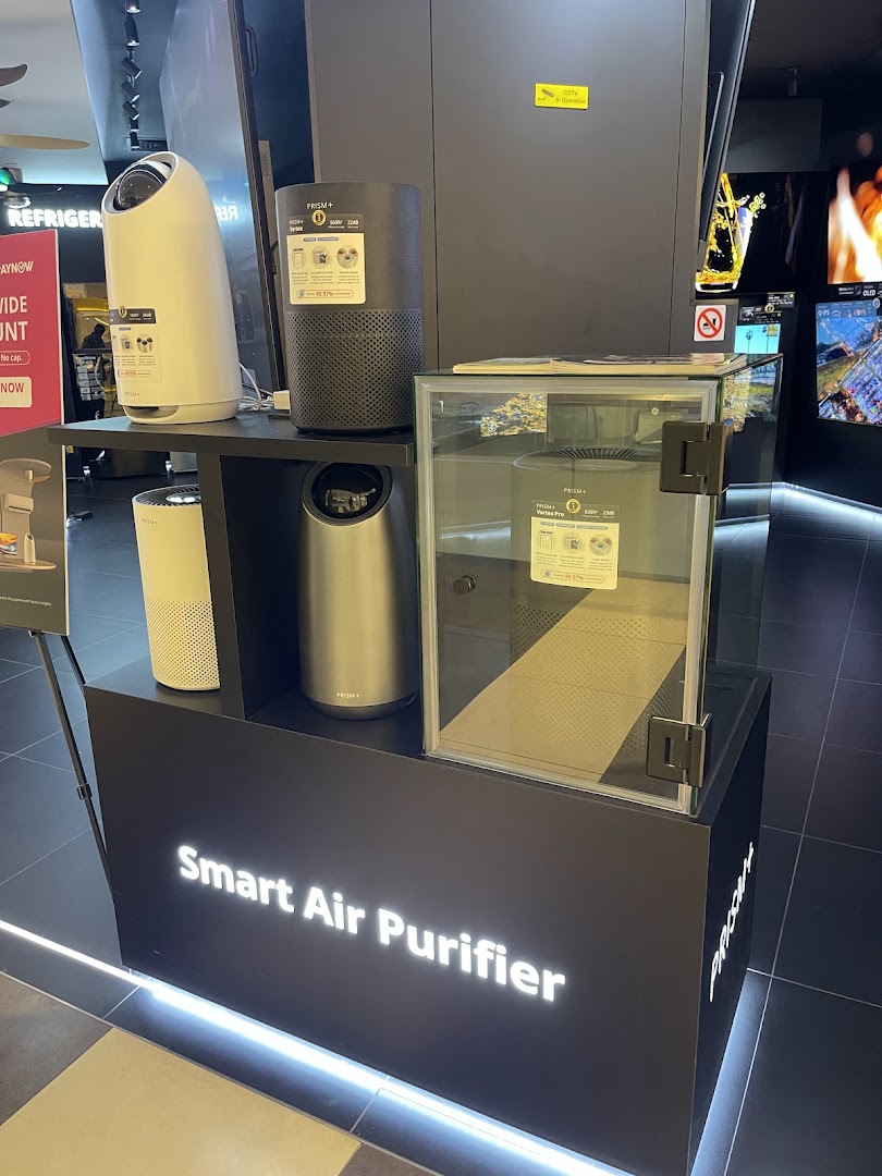A retail display showcasing various models of PRISM+ smart air purifiers.