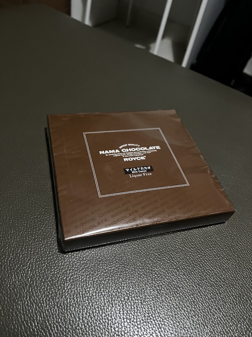 A sealed box of Royce' Nama Chocolate, featuring 'Mild Cacao' and 'Liquor Free' labels.
