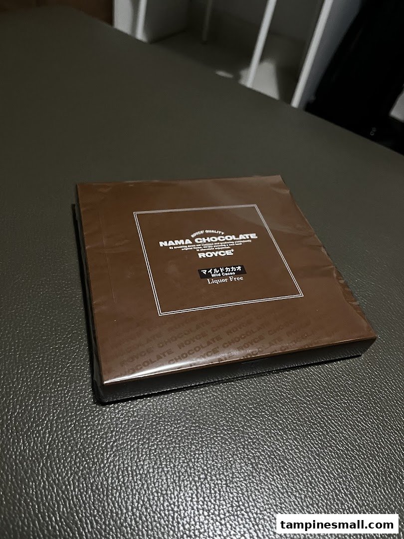 A sealed box of Royce' Nama Chocolate, featuring 'Mild Cacao' and 'Liquor Free' labels.