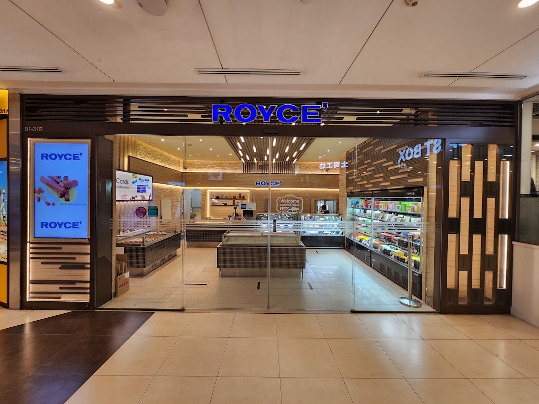 The storefront of Royce chocolate shop, showcasing its inviting entrance and product displays.