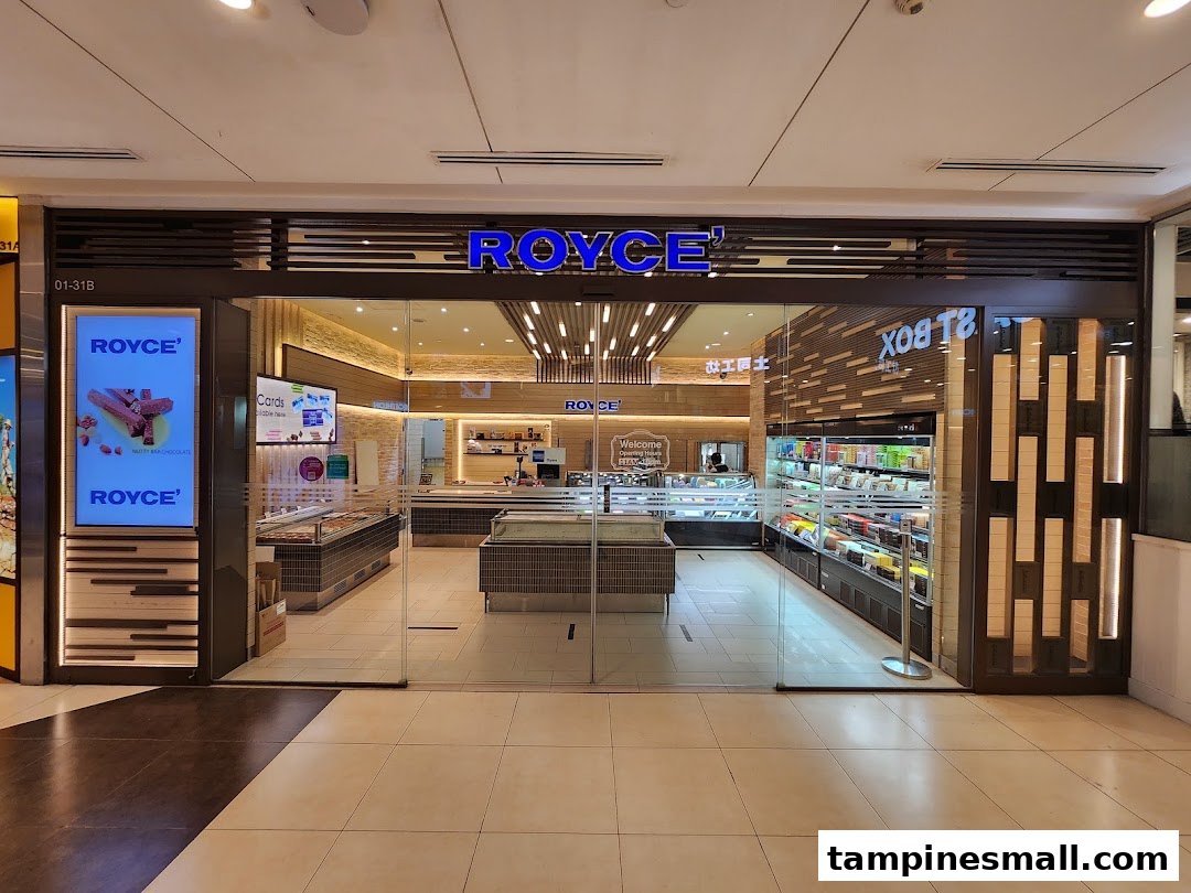 The storefront of Royce chocolate shop, showcasing its inviting entrance and product displays.