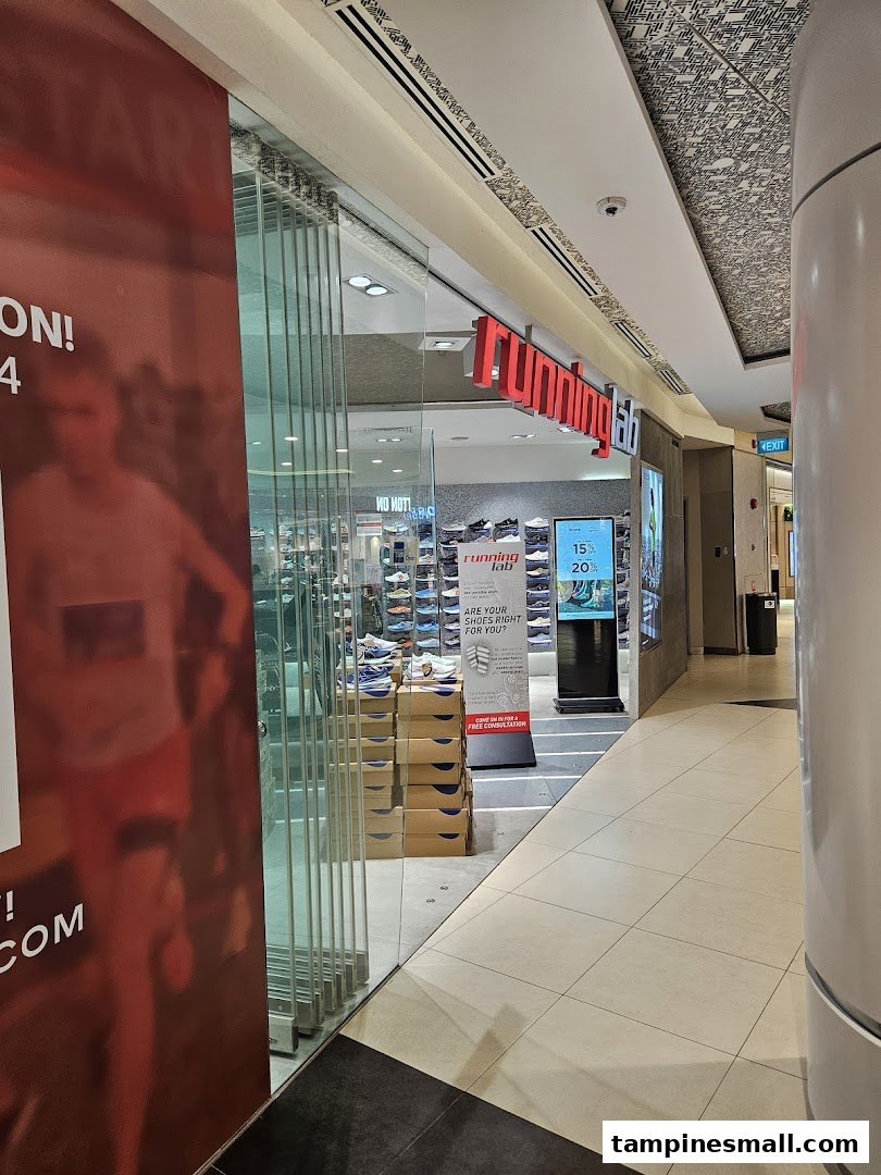 The entrance of Running Lab Tampines, a specialty running shoe store, with visible displays.