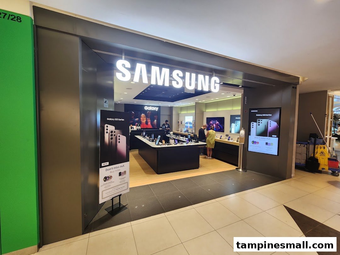The brightly lit entrance of a Samsung Experience Store, showcasing the latest Galaxy S23 Series and inviting customers inside.