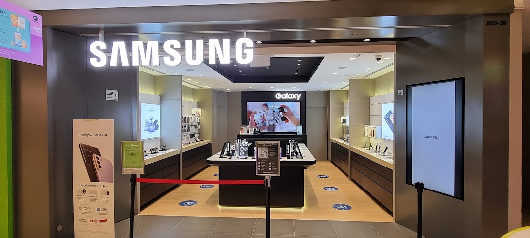 The inviting entrance of a Samsung Experience Store, showcasing modern electronics displays.