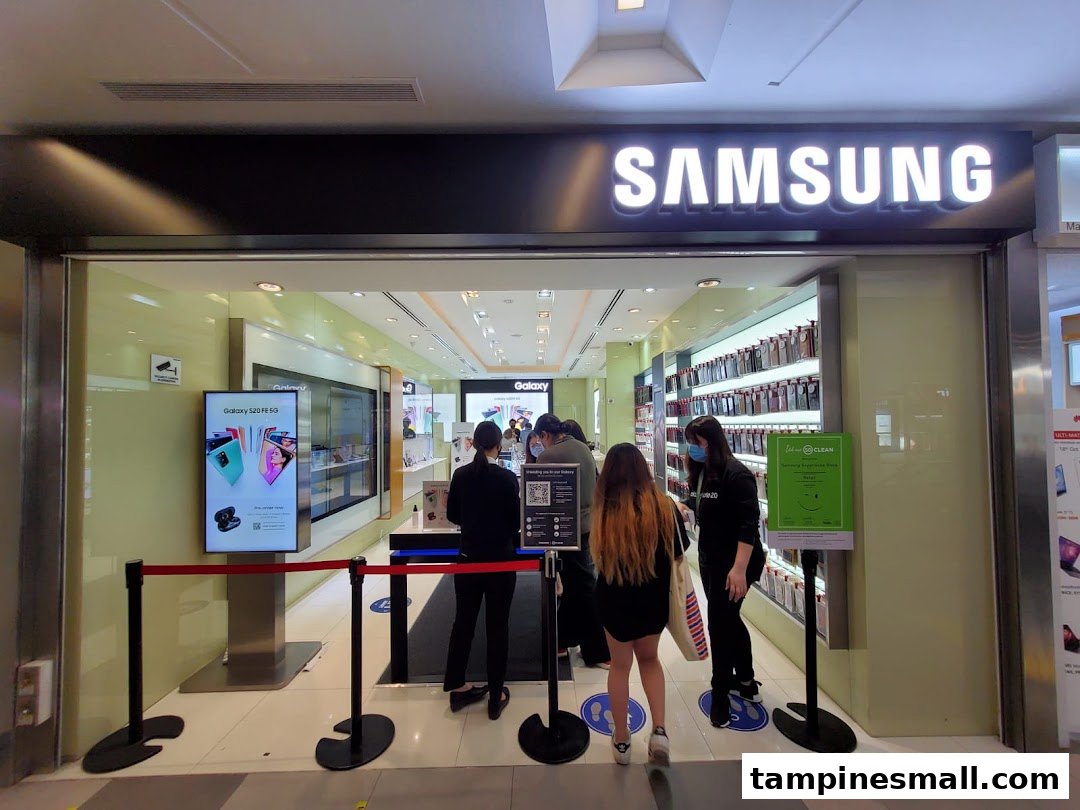 The inviting entrance of a Samsung Experience Store, showcasing new products and welcoming customers.