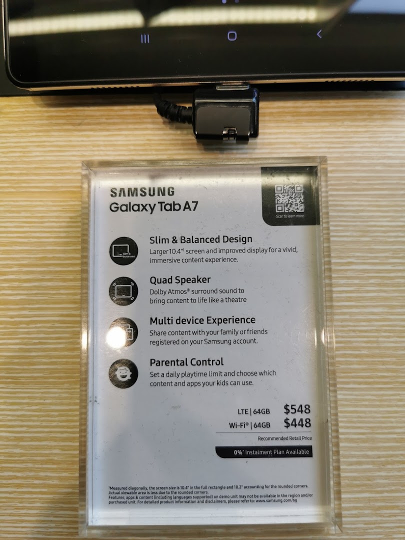 A close-up of a Samsung Galaxy Tab A7 display card showing features and prices.