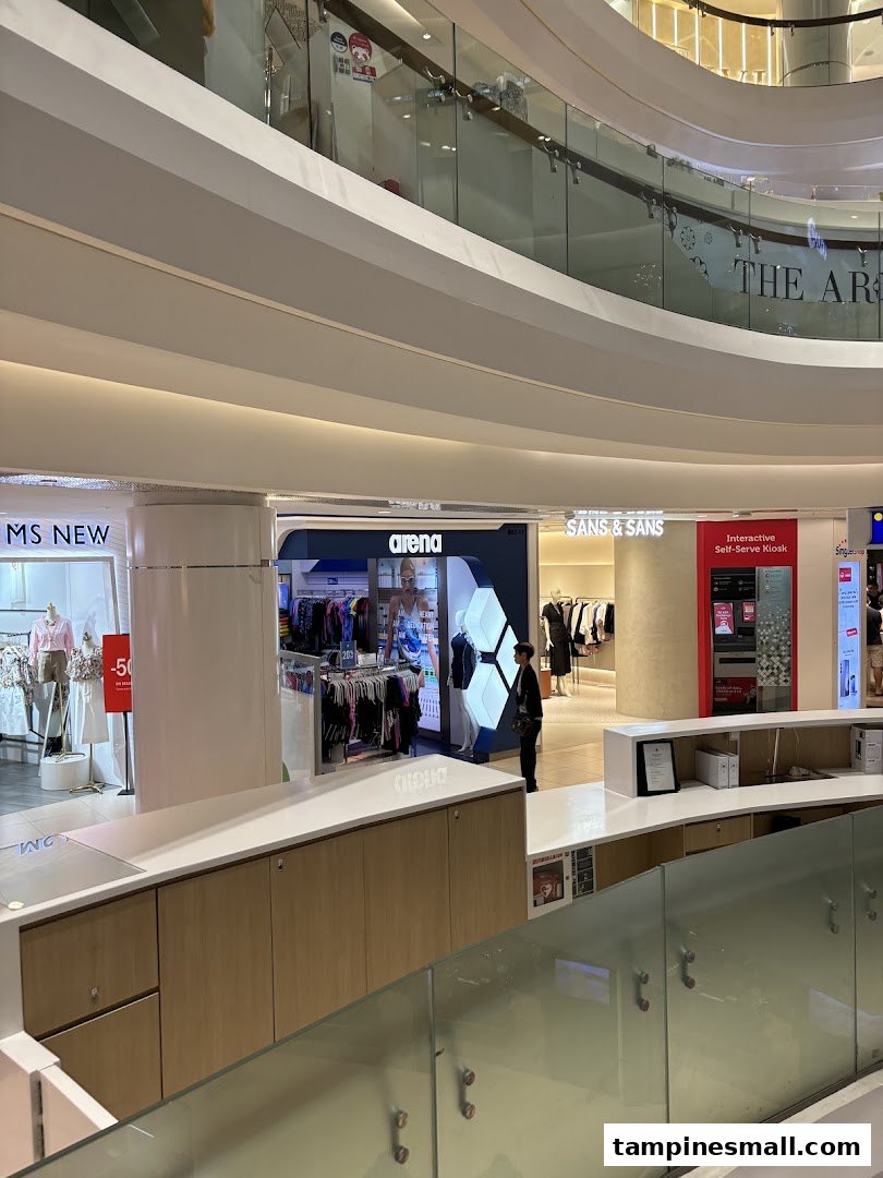 The SANS & SANS shop front, showcasing its entrance and surrounding mall environment.