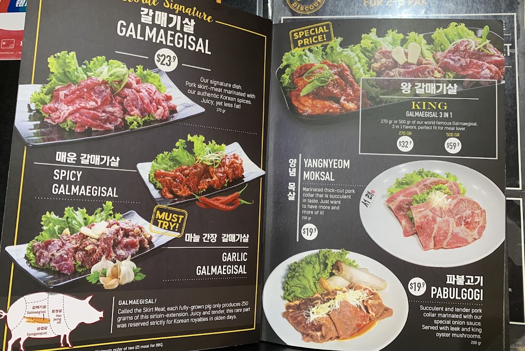 A detailed menu displaying various Korean BBQ pork cuts and marinated dishes with prices and descriptions.