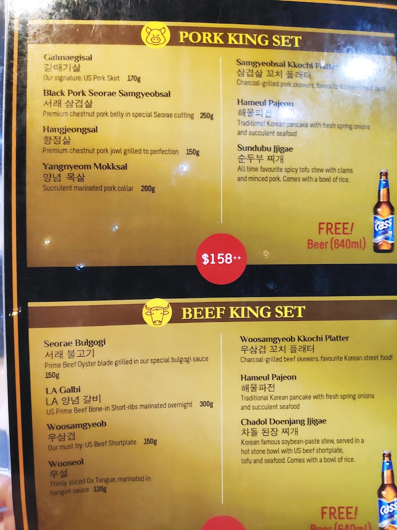 A detailed menu board showcasing Korean BBQ 'King Sets' with various pork and beef options.