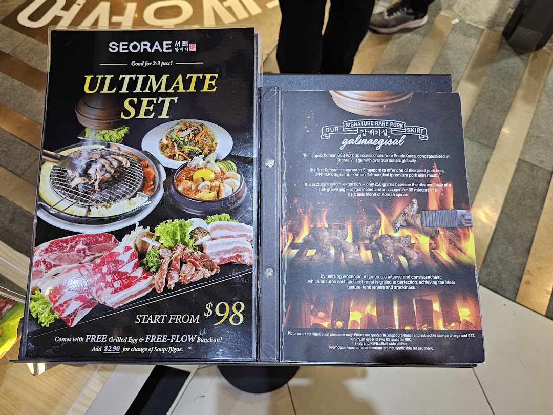 Two menu pages from Seorae Jib, showcasing Korean BBQ sets and specialty pork cuts.