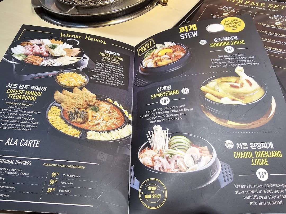 A detailed menu page from Seorae Jib, showcasing Korean stews and hot pot dishes with descriptions and prices.