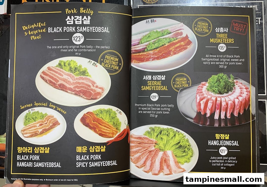 A detailed menu showcasing various premium black pork cuts and Korean BBQ dishes.