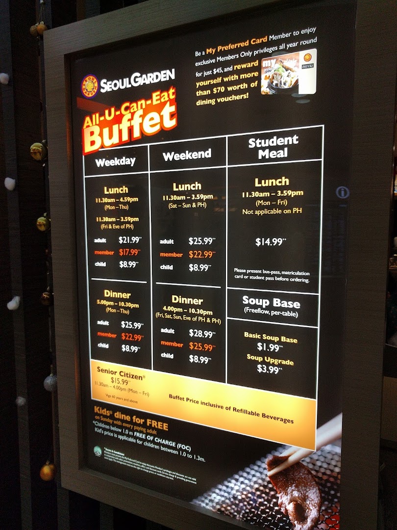 A digital menu board displaying Seoul Garden's all-you-can-eat buffet prices and promotions.