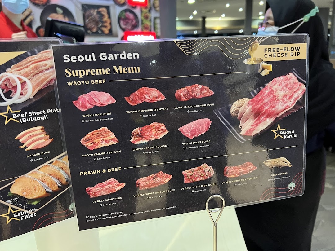 A menu display from Seoul Garden showcasing their Supreme Menu with various Wagyu beef and seafood options.