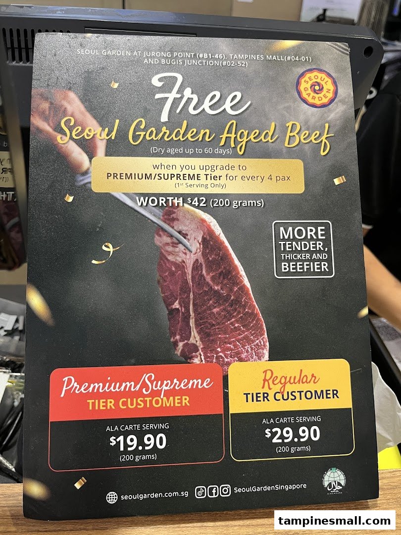 A promotional poster for Seoul Garden's aged beef offer and ala carte pricing for different customer tiers.