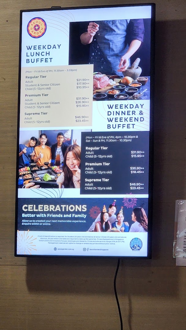 A digital display board showcasing Seoul Garden's weekday lunch, dinner, and weekend buffet prices and tiers.