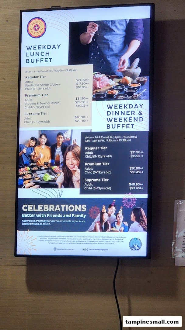 A digital display board showcasing Seoul Garden's weekday lunch, dinner, and weekend buffet prices and tiers.