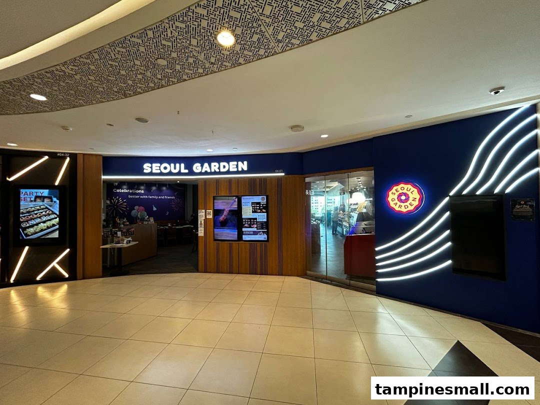 The vibrant blue shopfront of Seoul Garden, a Korean BBQ and hotpot restaurant, with bright signage and entrance.