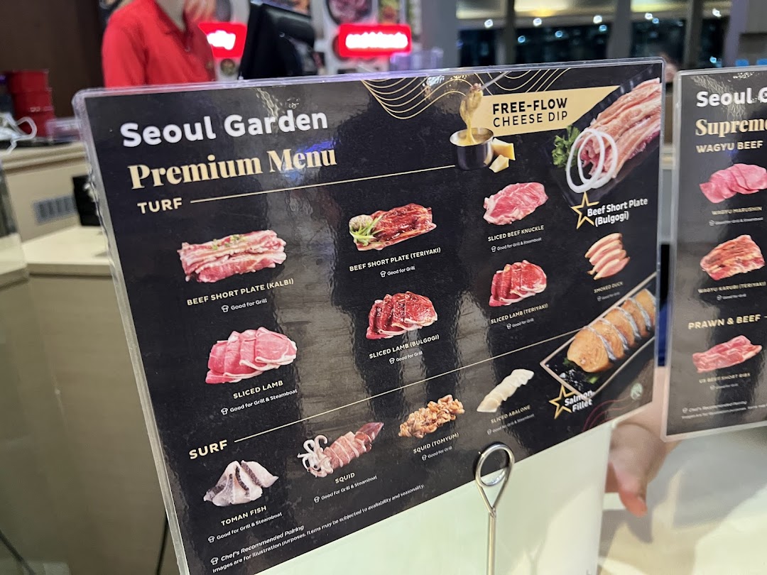 A close-up view of Seoul Garden's Premium Menu, showcasing various meat and seafood options.