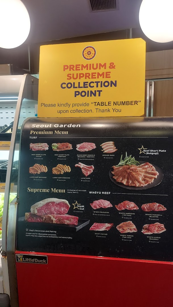 A display showcasing Seoul Garden's premium and supreme meat cuts, including Wagyu beef, for collection.