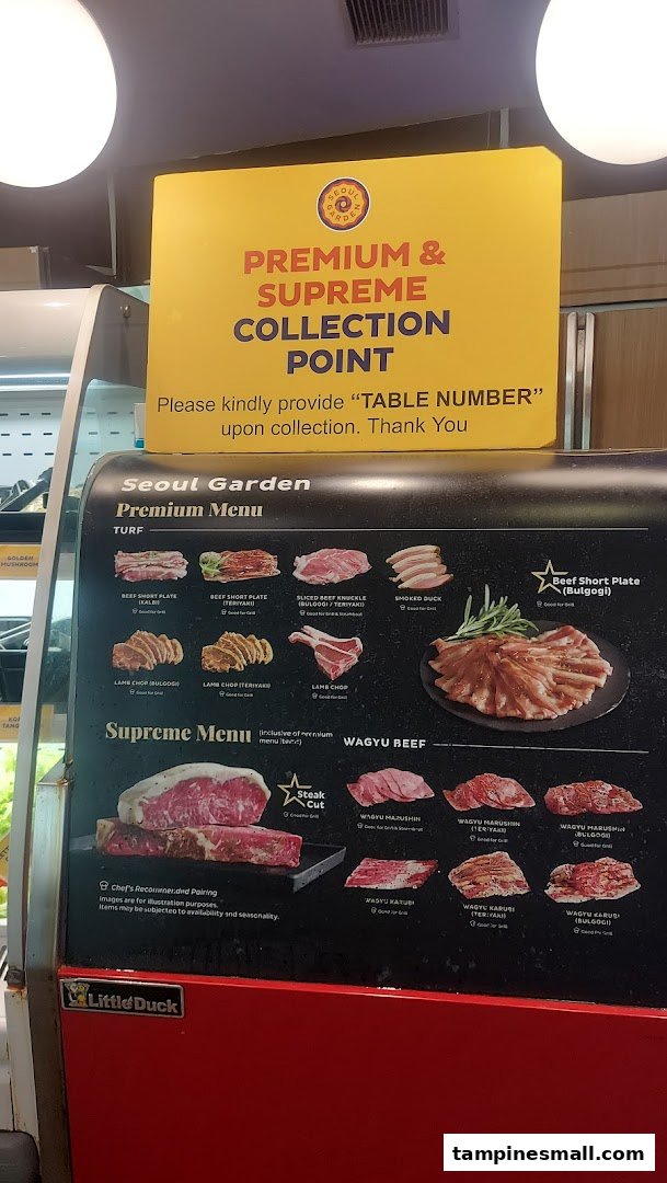 A display showcasing Seoul Garden's premium and supreme meat cuts, including Wagyu beef, for collection.