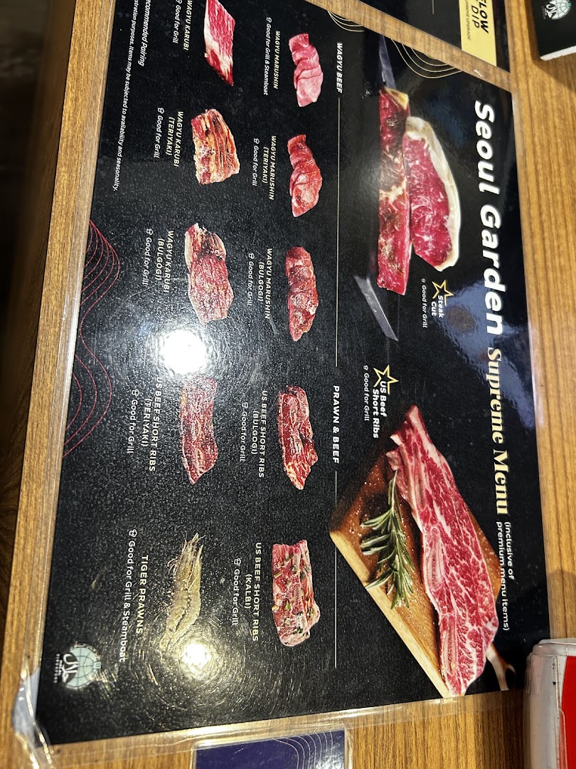 A close-up of Seoul Garden's Supreme Menu, showcasing premium meats and seafood for grilling.