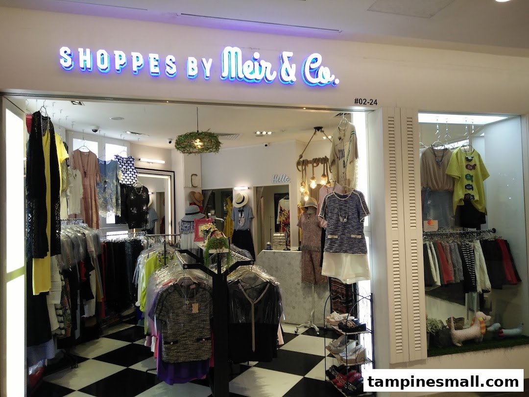 The shop front of Shoppes by Meir & Co., showcasing a variety of women's fashion and accessories.