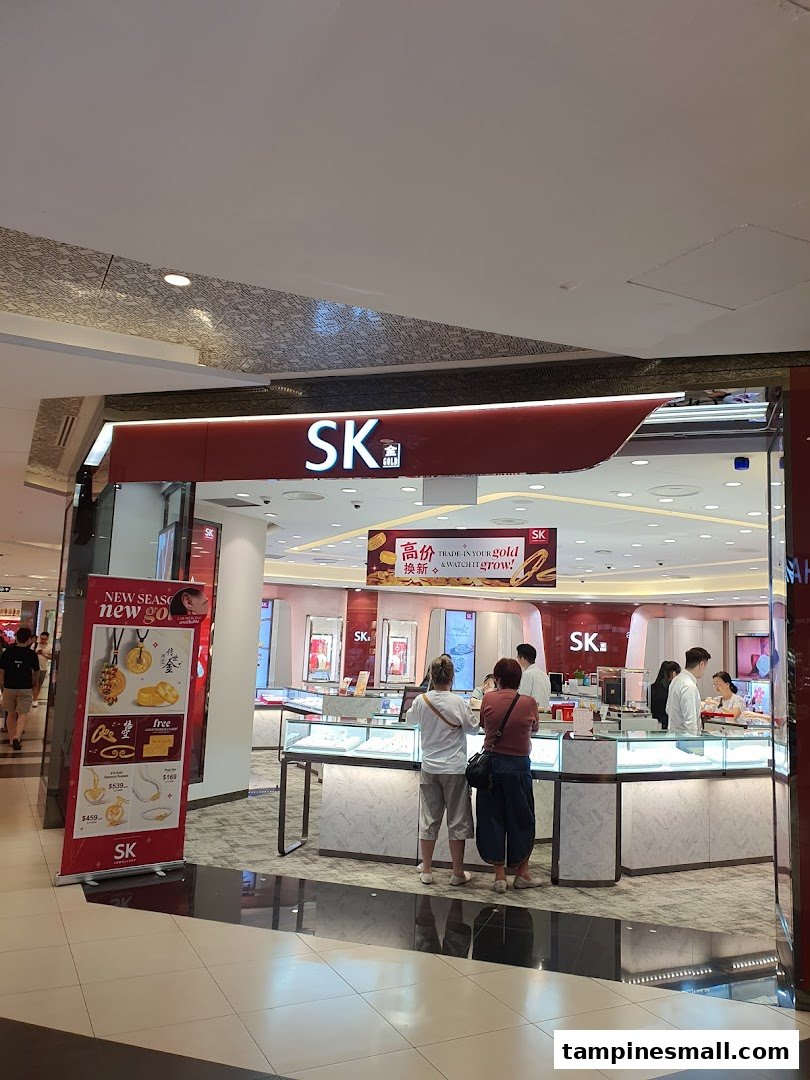 The storefront of SK Gold at Tampines Mall, showcasing its interior with customers browsing gold and jewelry.