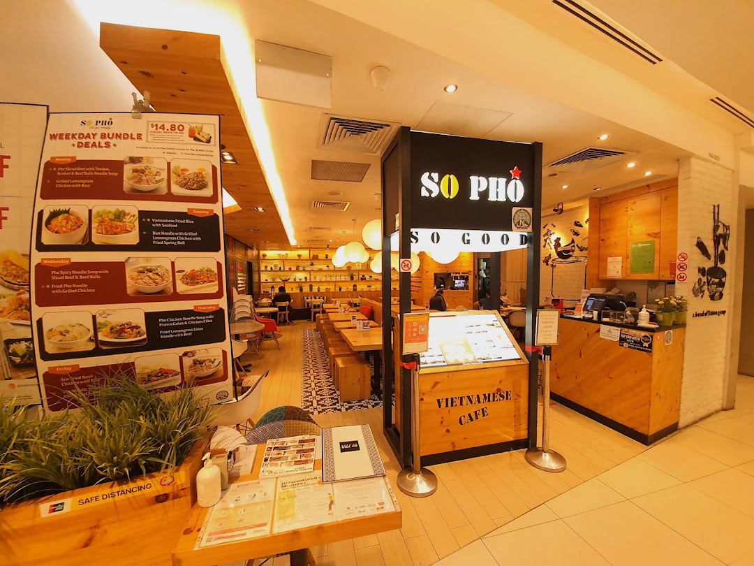 The inviting entrance of So Pho Vietnamese Cafe, showcasing its bright interior and promotional deals.