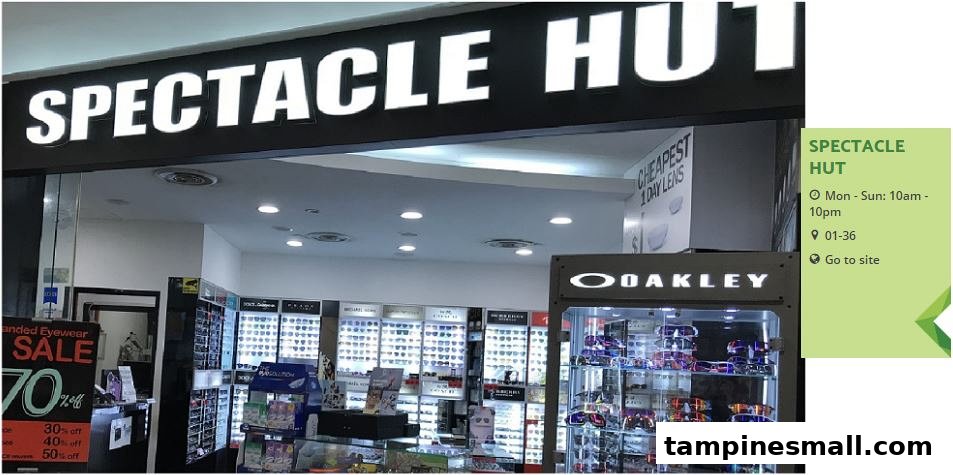 The storefront of Spectacle Hut, an eyewear shop, featuring displays of glasses and a sale promotion.