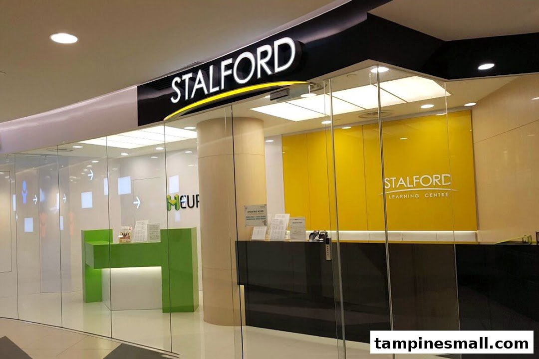 The modern glass storefront of Stalford Learning Centre, featuring prominent signage and a bright interior.