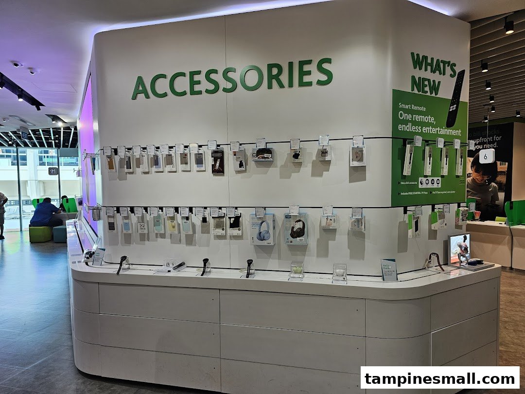 Interior view of StarHub Tampines Mall, featuring a prominent display of mobile accessories and smart remotes.
