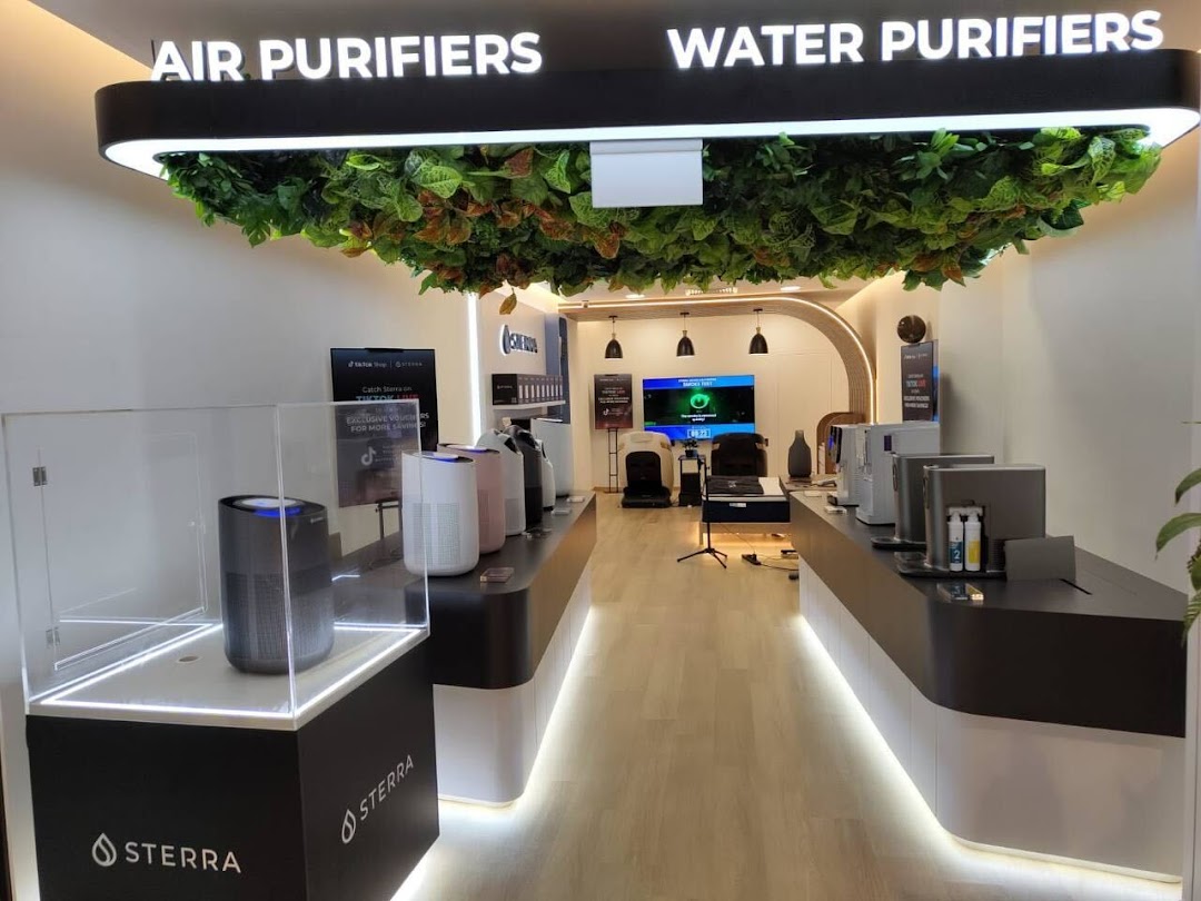 Interior view of Sterra Singapore, showcasing air and water purifiers in a modern display.