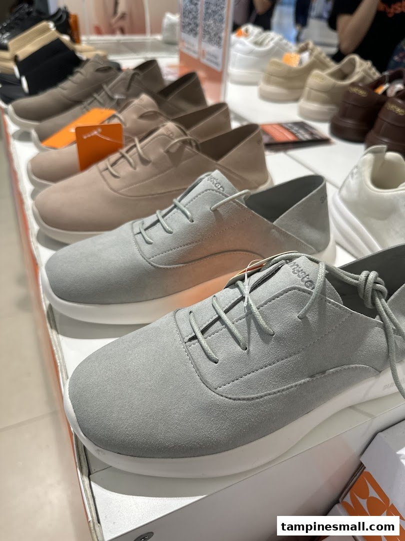 A close-up view of various comfortable and stylish shoes displayed on shelves at Sunnystep.