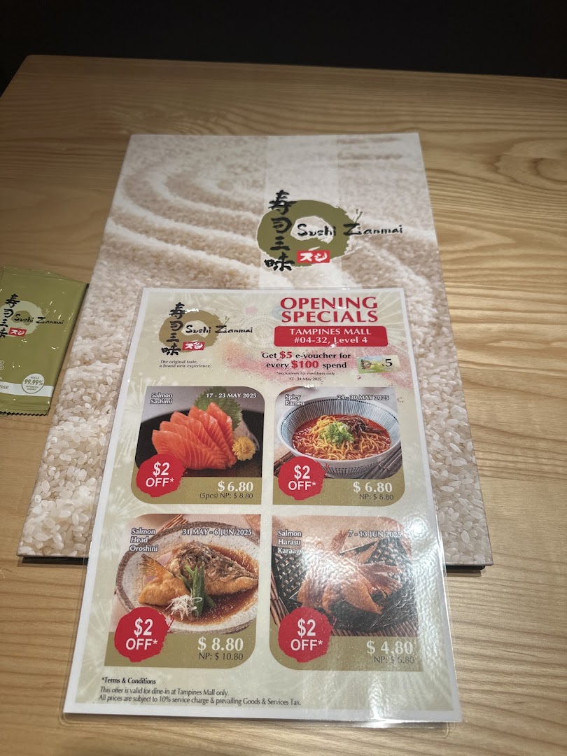 A promotional flyer and menu for Sushi Zanmai, showcasing opening specials and discounts on various sushi and Japanese dishes.